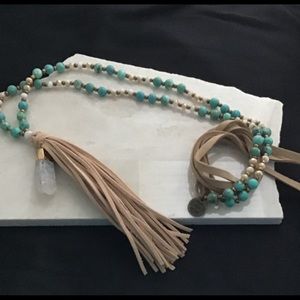 Beaded necklace with leather and quartz